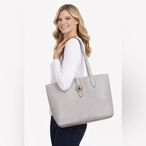Kate Spade New York Gray Leather Tote Bag with Floral Turn-Lock Closure